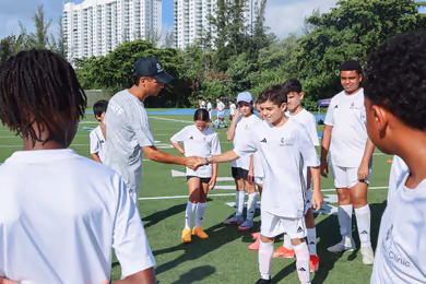 Fundación Real Madrid soccer camp players training outdoors