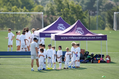 Youth soccer player practicing at a Fundación Real Madrid camp