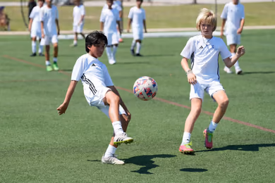 Young soccer players during Fundación Real Madrid camp drills