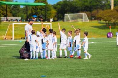 Fundación Real Madrid soccer camp group activity