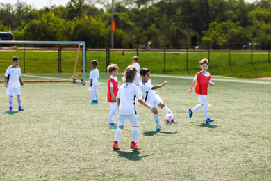 Fundación Real Madrid soccer camp players on the training field