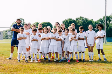 Real Madrid soccer camp players during a team activity